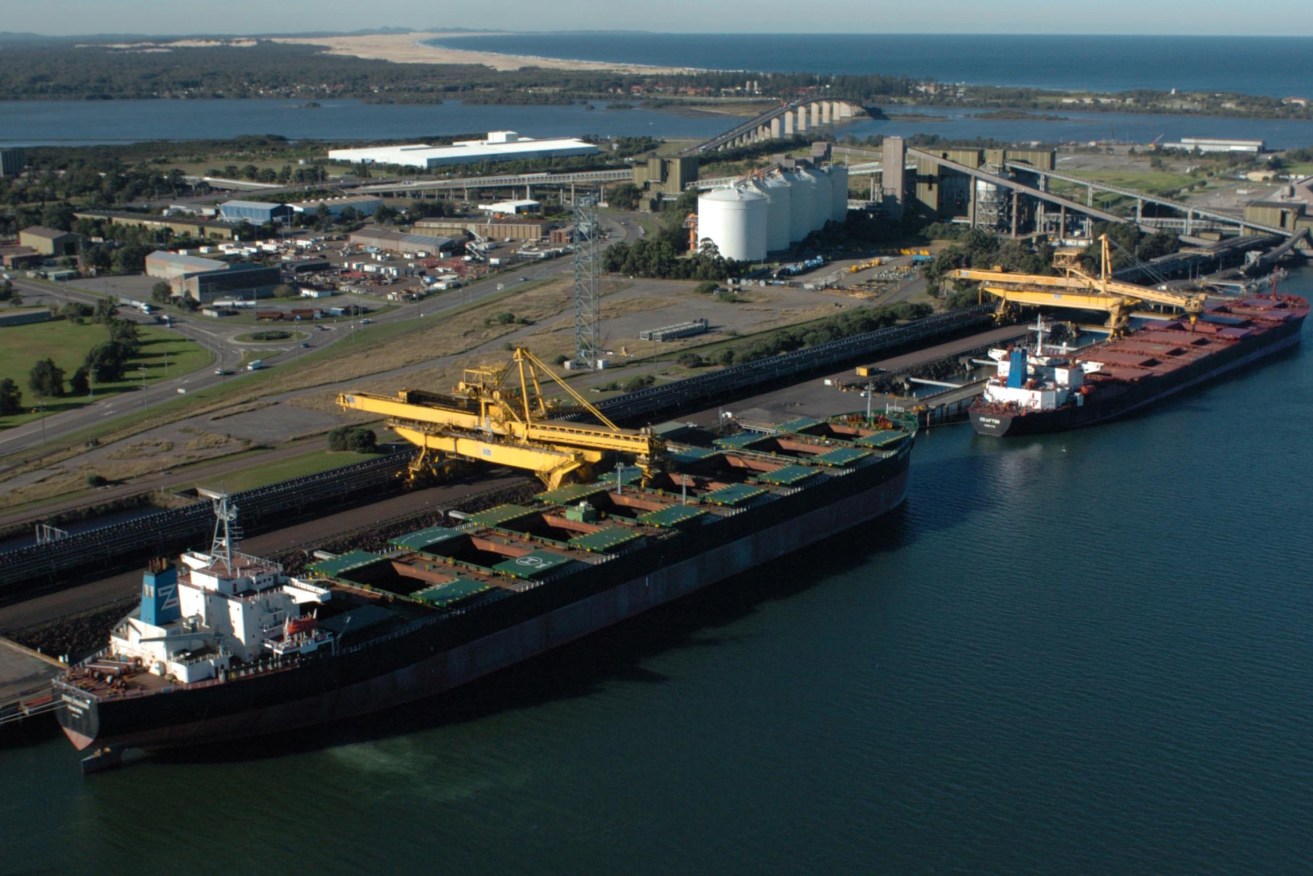 Coal ships are loaded with their cargo at Port Waratah, Newcastle.