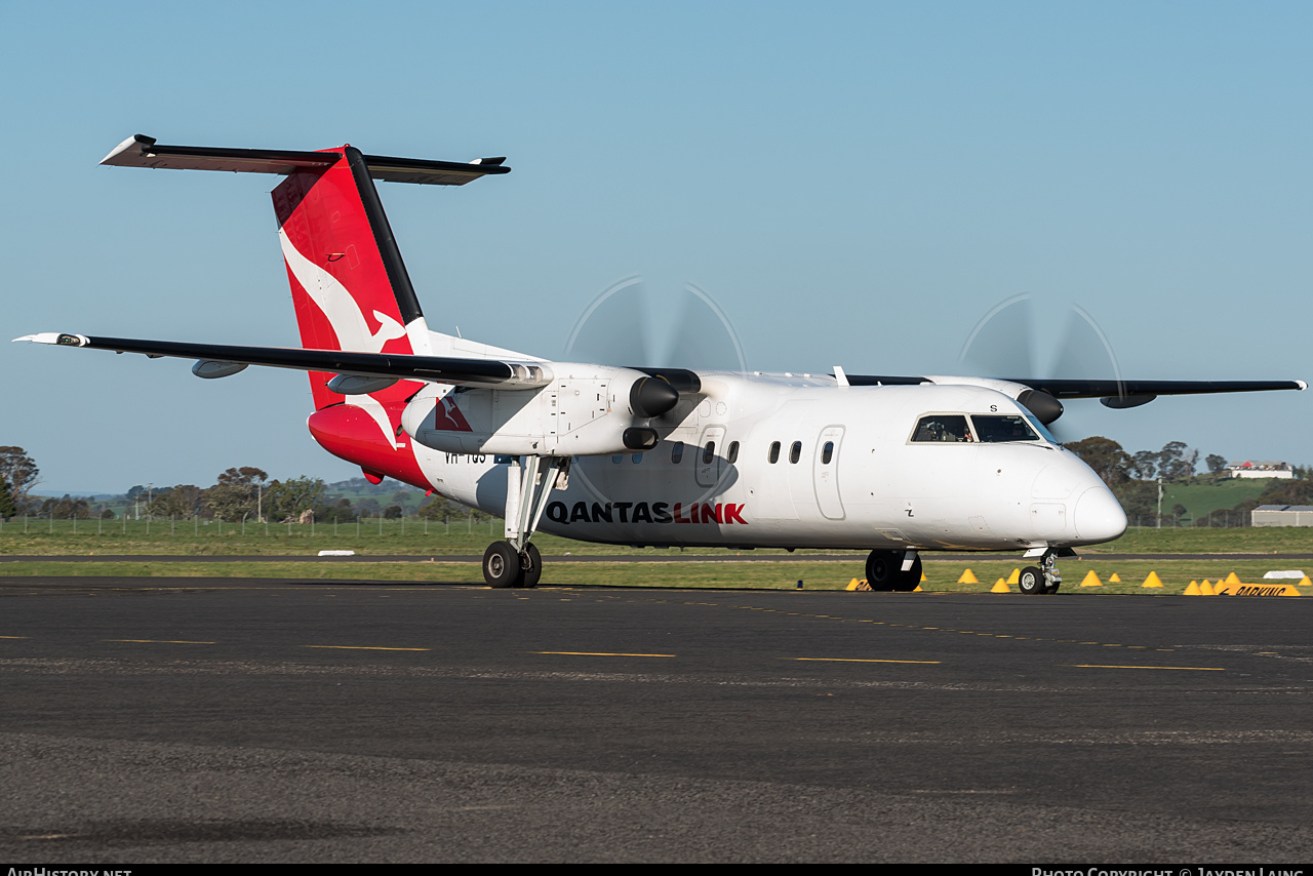 A Qantaslink flight was forced to evacuate after the plane caught fire at Sydney airport.