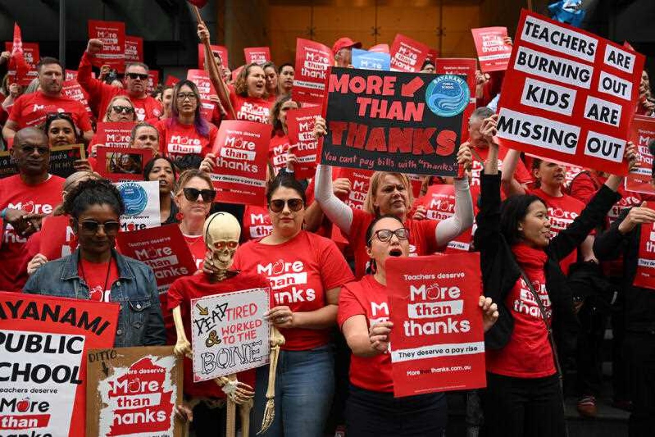 A pay decision for NSW teachers has been labelled an "insulting" pay cut by union officials. 