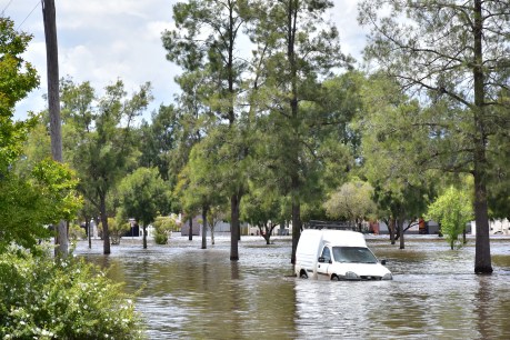 Storms threaten more flooding in NSW, Victoria