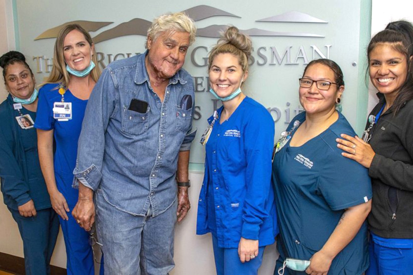 Comedian Jay Leno with some of the hospital staff who looked after him.
