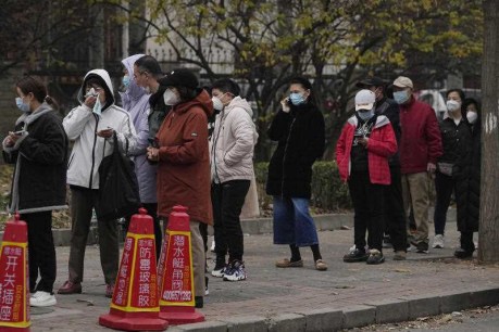 China lockdowns expand amid record virus cases