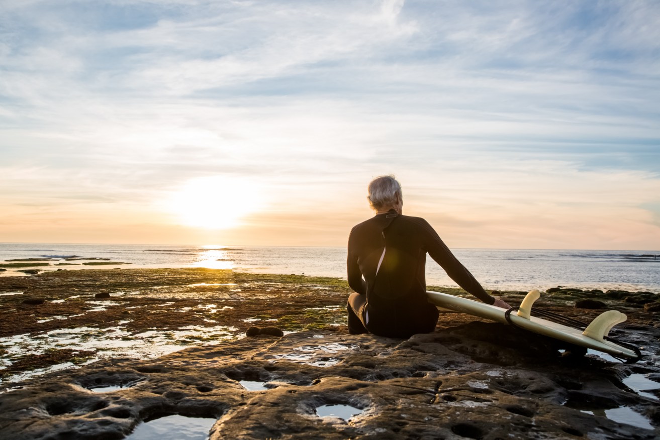 More older people are taking up surfing as a way of negotiating their way through ageing. Photo: Getty