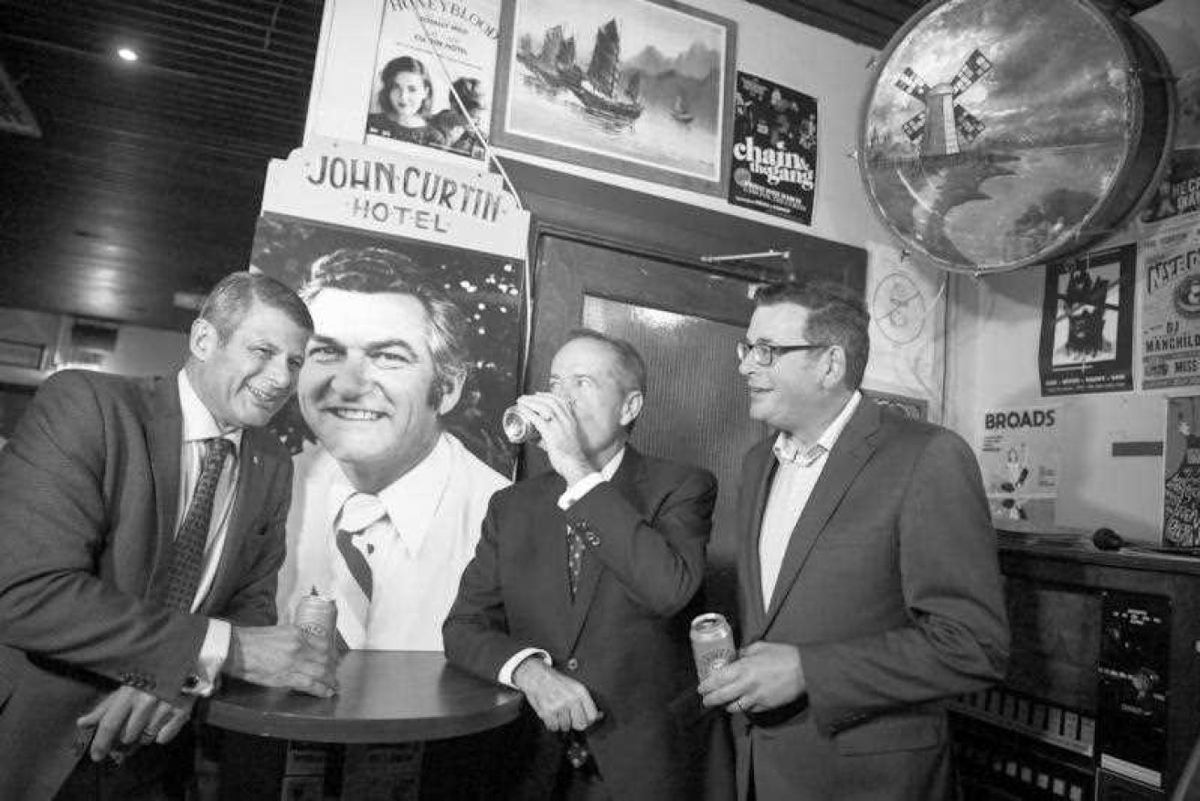 The John Curtin Hotel has long been a destination for unionists, political types and musicians. Labor luminaries Steve Bracks [left], Bill Shorten and Dan Andrews enjoy a beer.