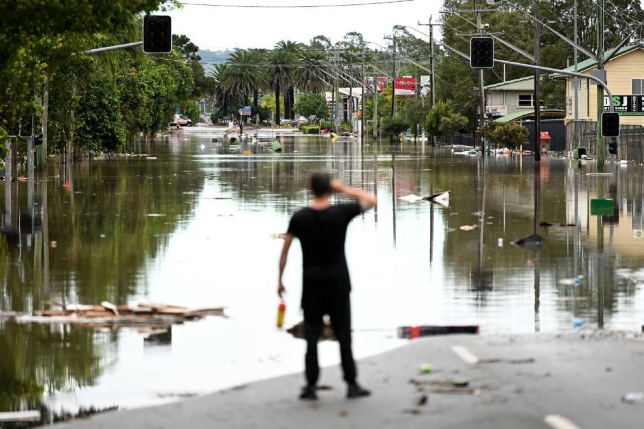 A main street is under floodwater on March 31, 2022 in Lismore, with months more to follow