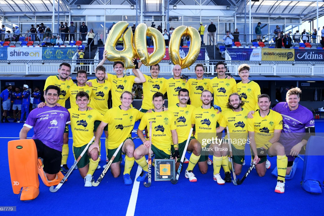 Eddie Ockenden, captain of the Kookaburras, poses for a team photo for his 400th game. 