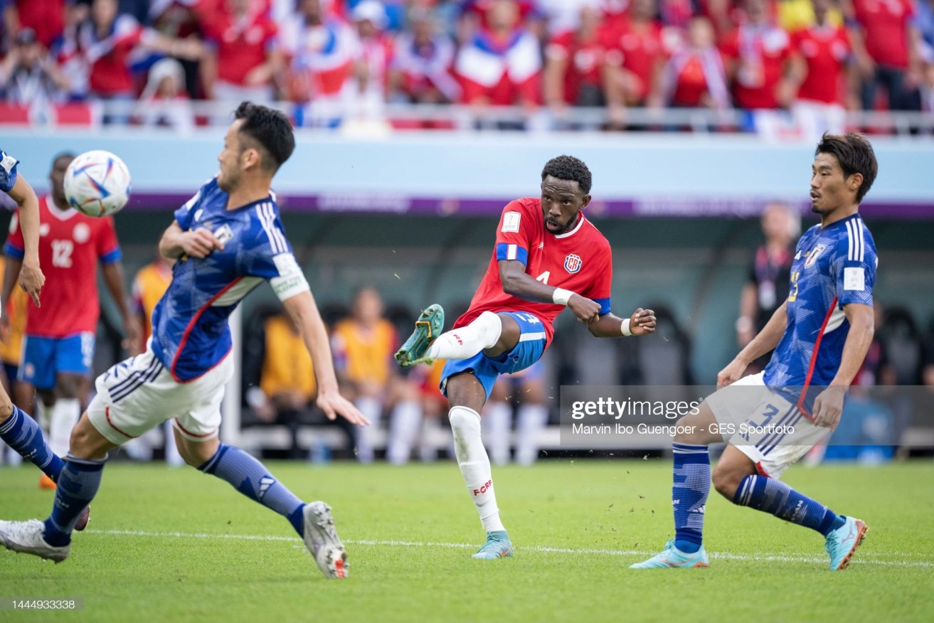 Costa Rica's Keysher Fuller  scores his team's only goal to decide the World Cup clash with  Japan.