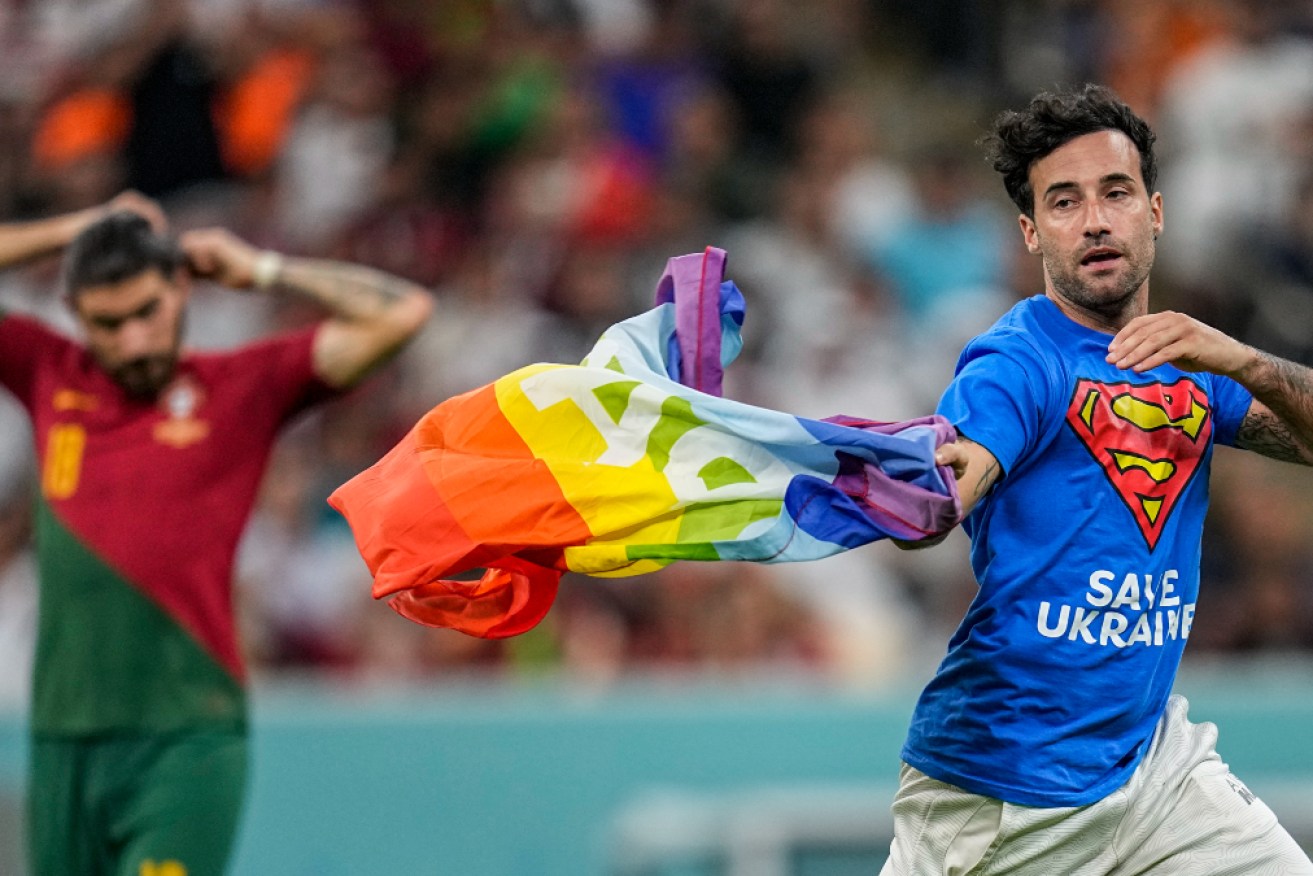 An enthusiastic protestor managed to run on the field during the Qatar World Cup.