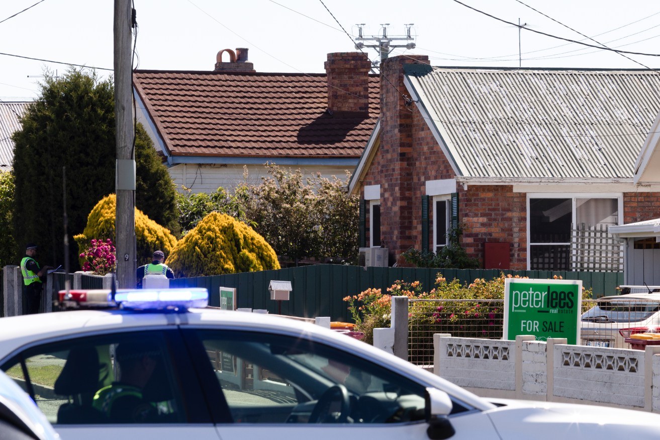 A three-year-old boy has died at a Launceston home and another boy has been severely injured.
