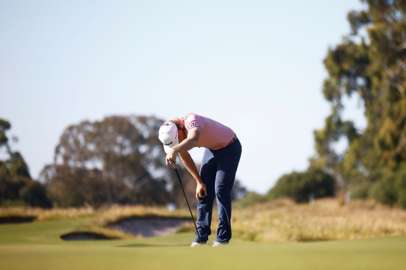 A dejected Cameron Smith hangs his head in dismay after another missed shot. <i>Photo: Getty</i>