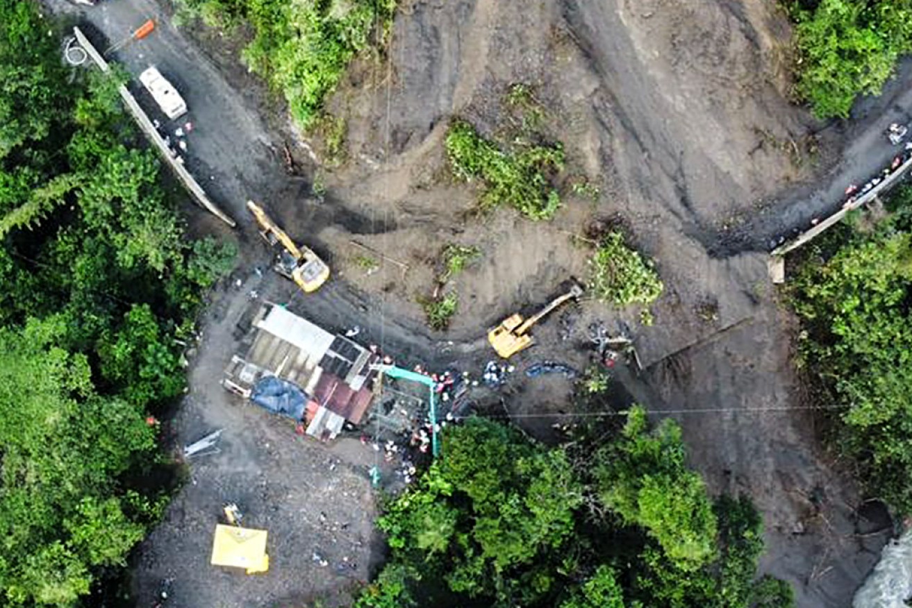 A landslide over part of a highway in Colombia has left 34 dead, including eight children.