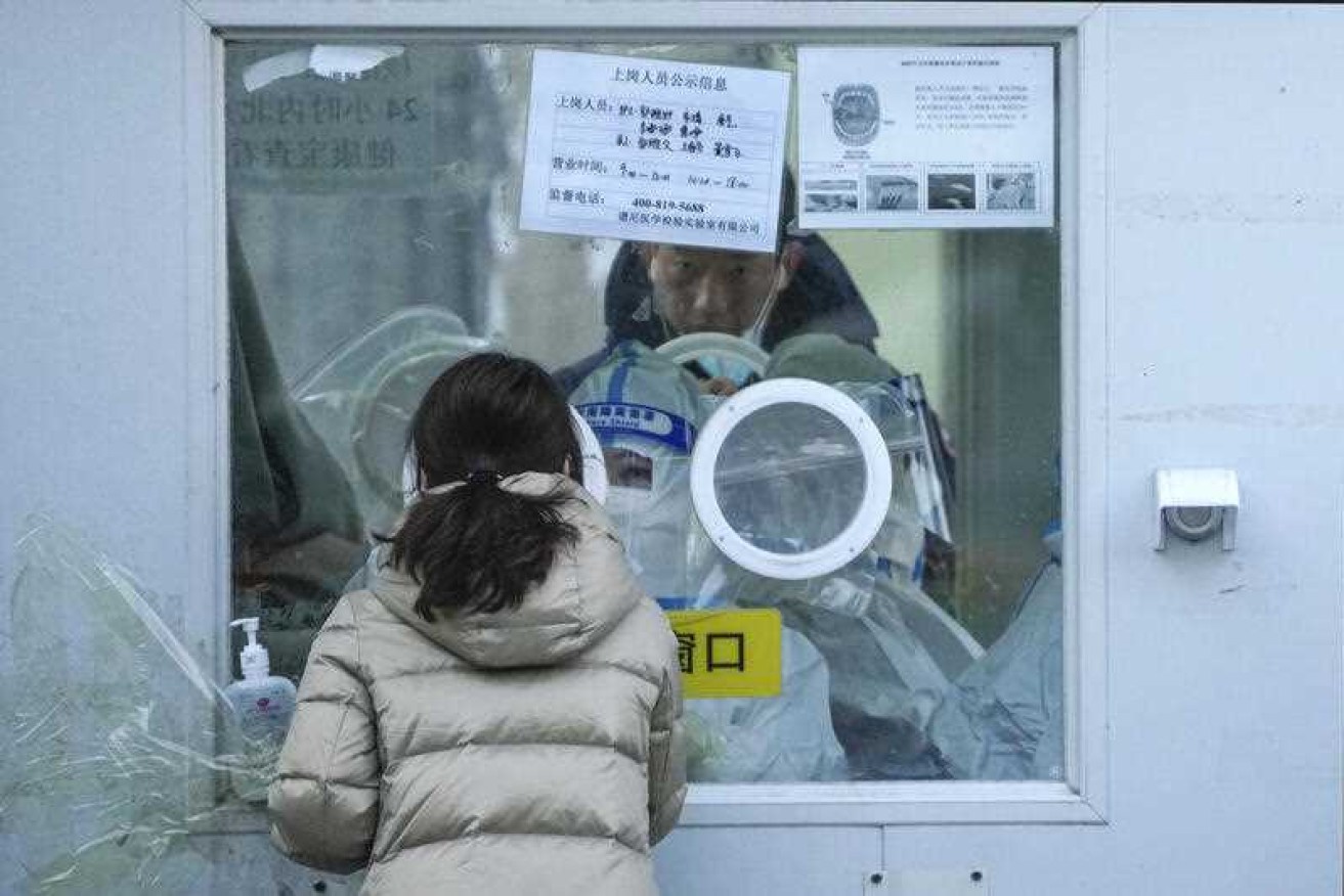 COVID-19 restrictions are easing across China but some people remain wary of catching the virus. 