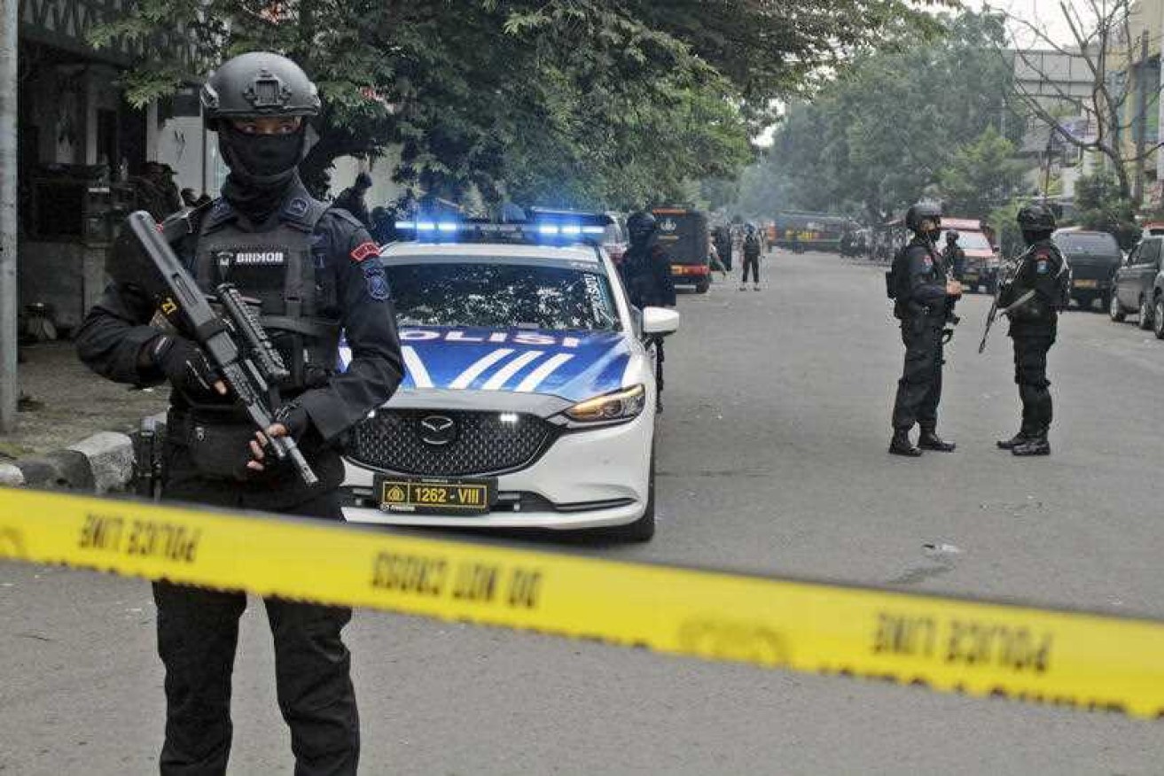 Officers have cordoned off a police station in West Java, Indonesia after a deadly explosion.