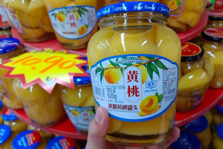 Chinese rush for canned peaches as COVID cure
