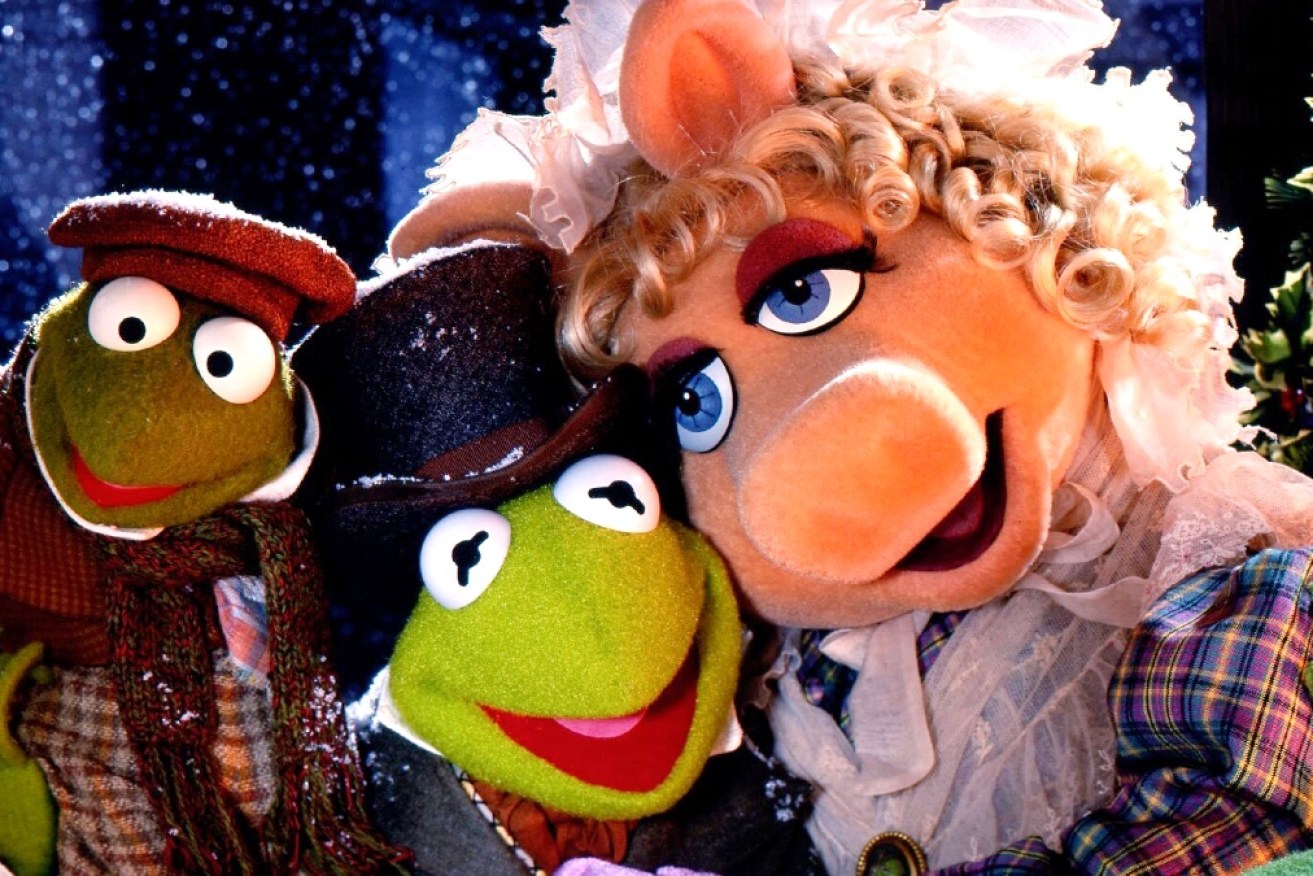 Kermit and Miss Piggy lead the Muppet cast of <i>The Muppet Christmas Carol </i> (1992).