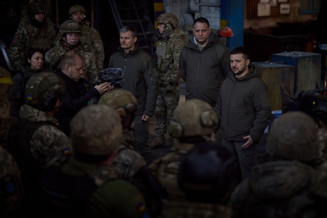 Ukrainian President Volodymyr Zelenskiy has visited Bakhmut, as the war enters its 300th day.