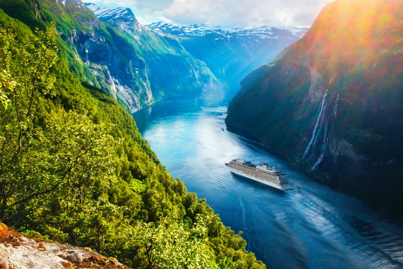 Breathtaking view of Sunnylvsfjorden fjord and famous Seven Sisters waterfalls, near Geiranger village in western Norway.