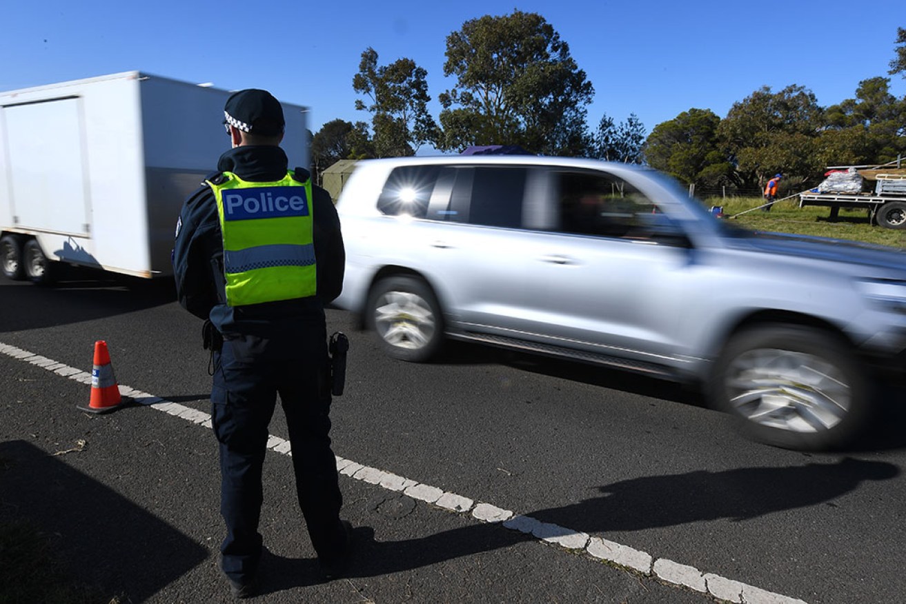 Two police officers have been hit by cars in separate incidents in NSW and Victoria.