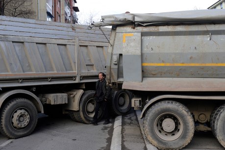 Tensions rise as Kosovo closes main border crossing to Serbia