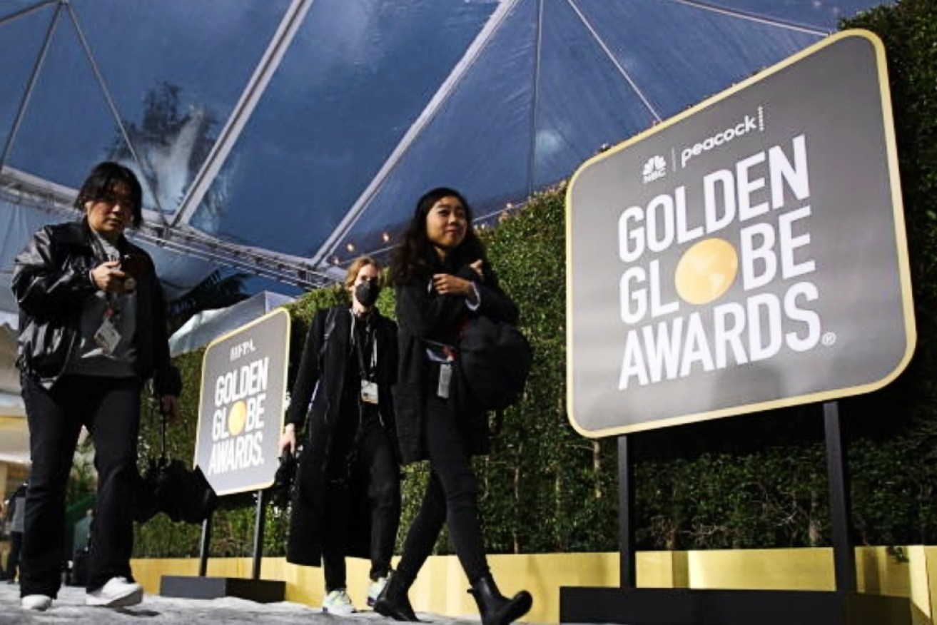 Crews at work setting up the 2023 Golden Globes in Los Angeles. 