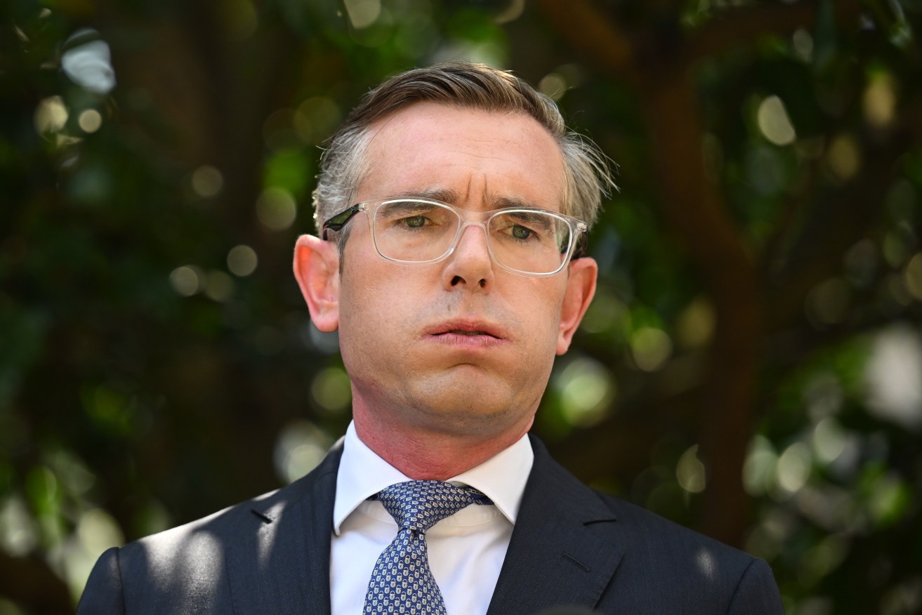 NSW Premier Dominic Perrottet concedes there have been "challenges'' after a $1b train blowout.