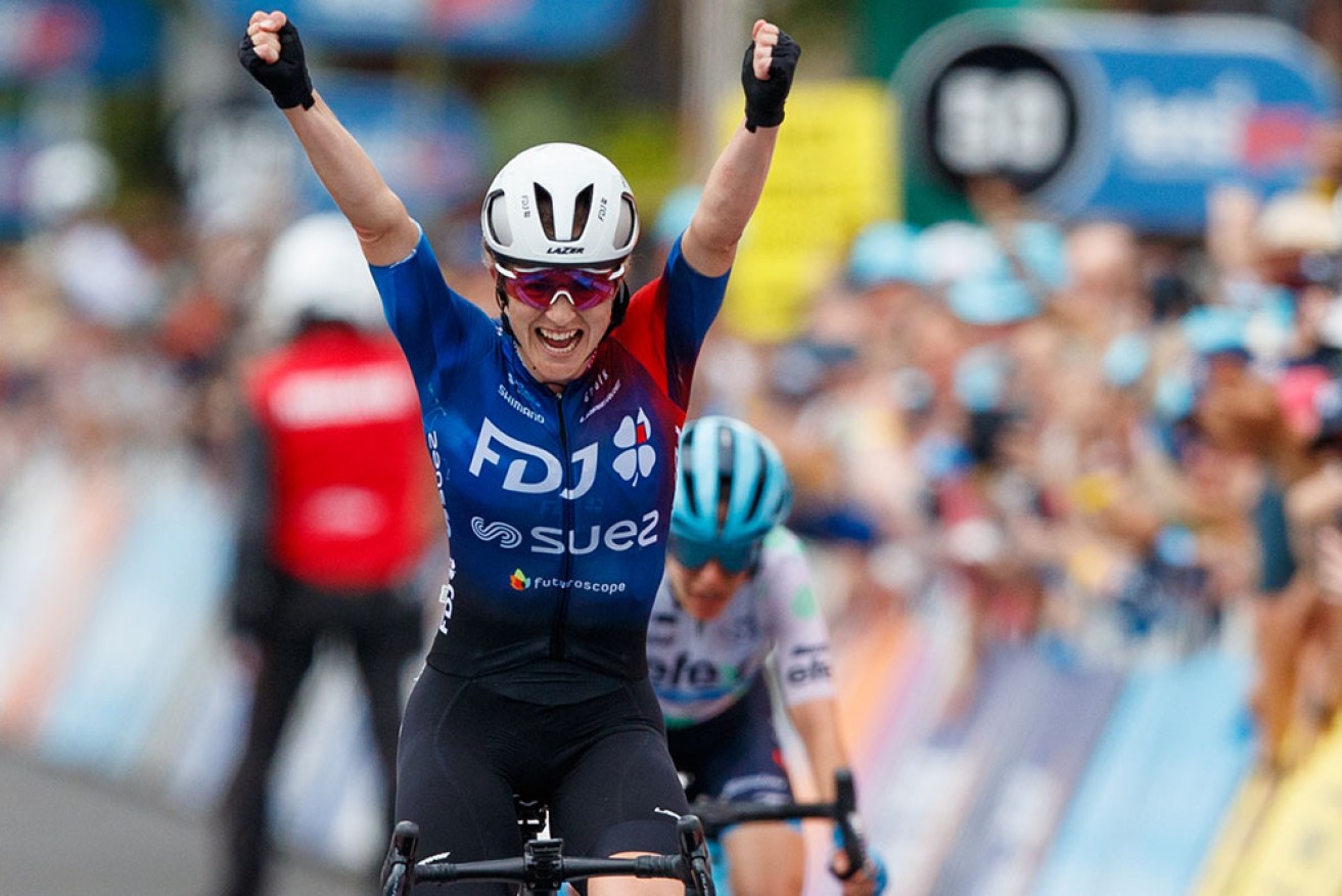 Grace Brown crosses the line to win Stage 3 and the general classification in the 2023 Tour Down Under. 