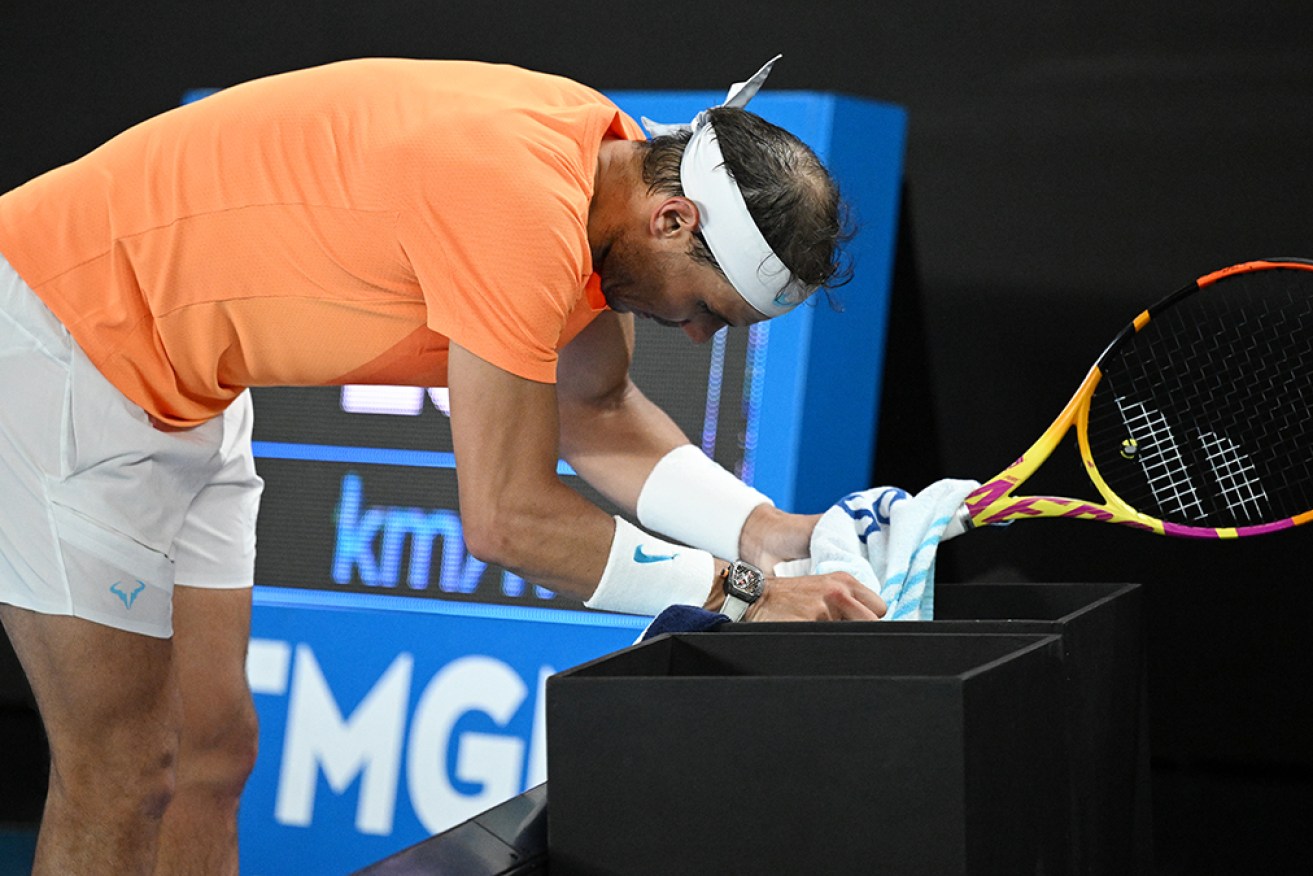 Rafael Nadal doubles over in pain during his Australian Open second-round loss on Wednesday. 