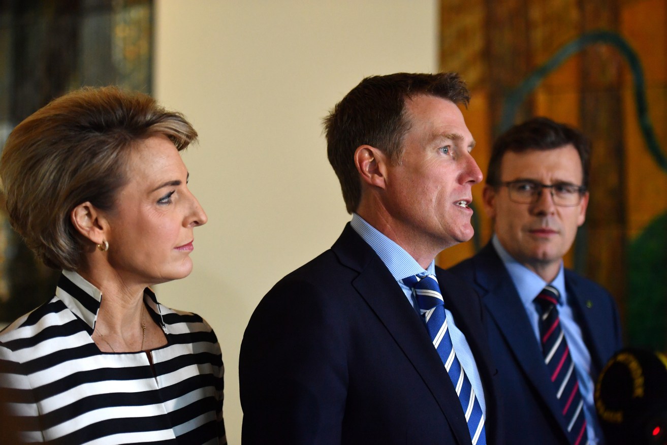Christian Porter (middle) and Alan Tudge (left) were accused on inappropriate relationships with staffers while in office. Photo: AAP