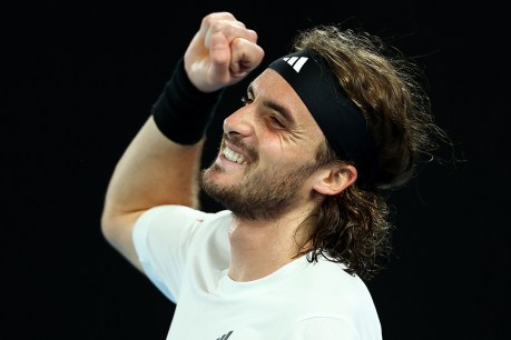 Tsitsipas charges into Melbourne semi-final