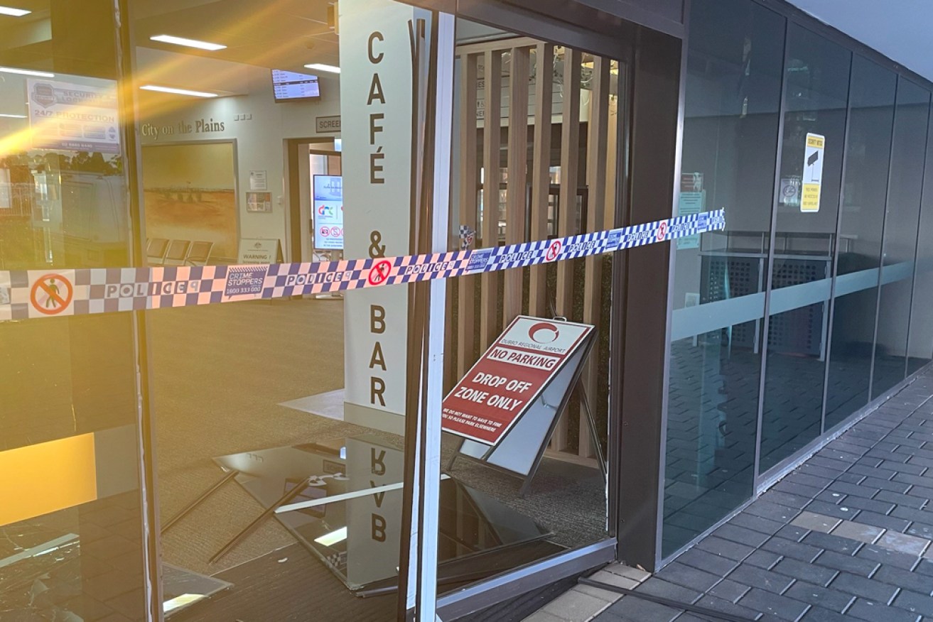 The damaged doors to Dubbo Airport on Tuesday morning.