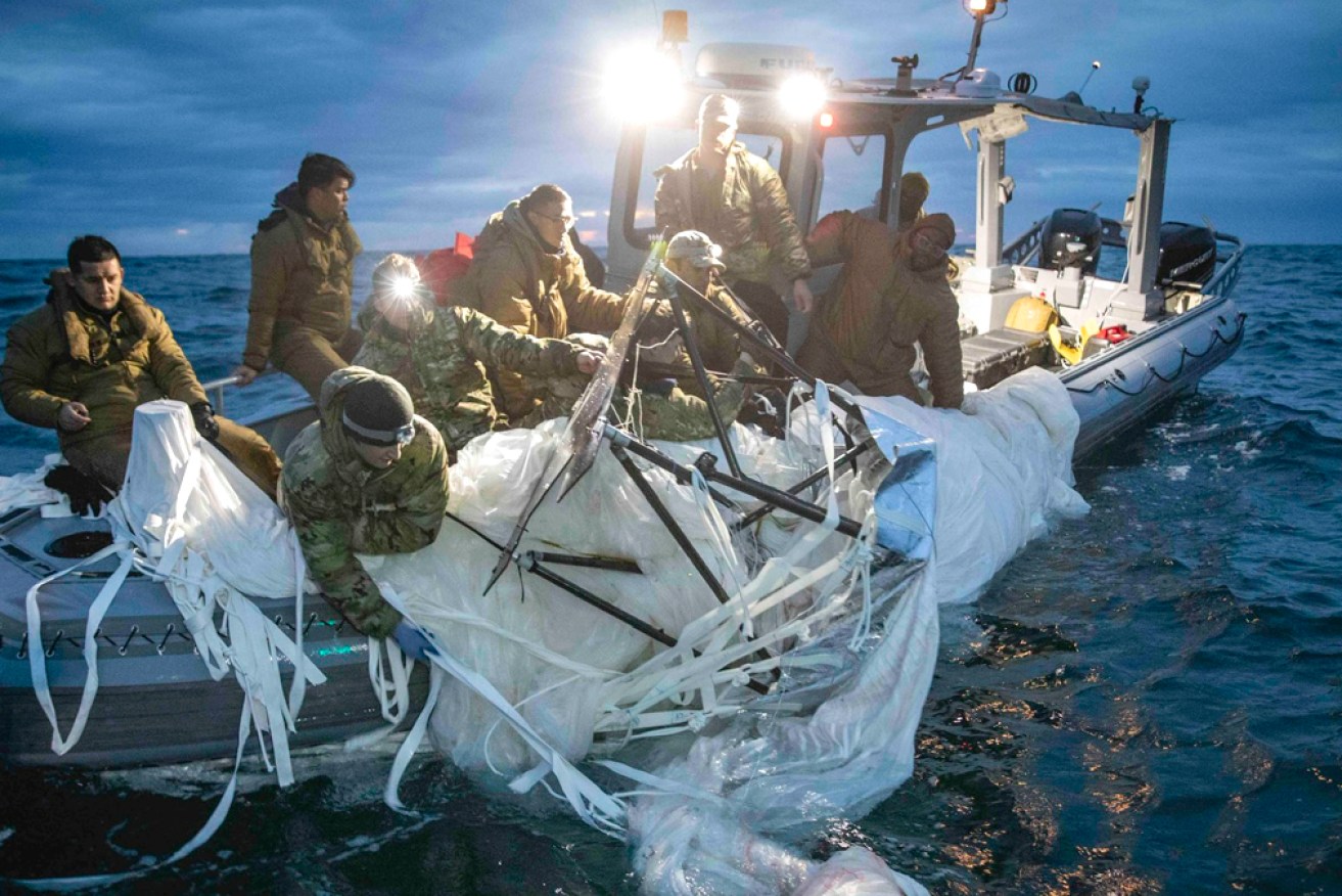 Searchers have concluded their hunt for the balloon's technology, now being analysed by the FBI. <i>Photo: US Navy</i>