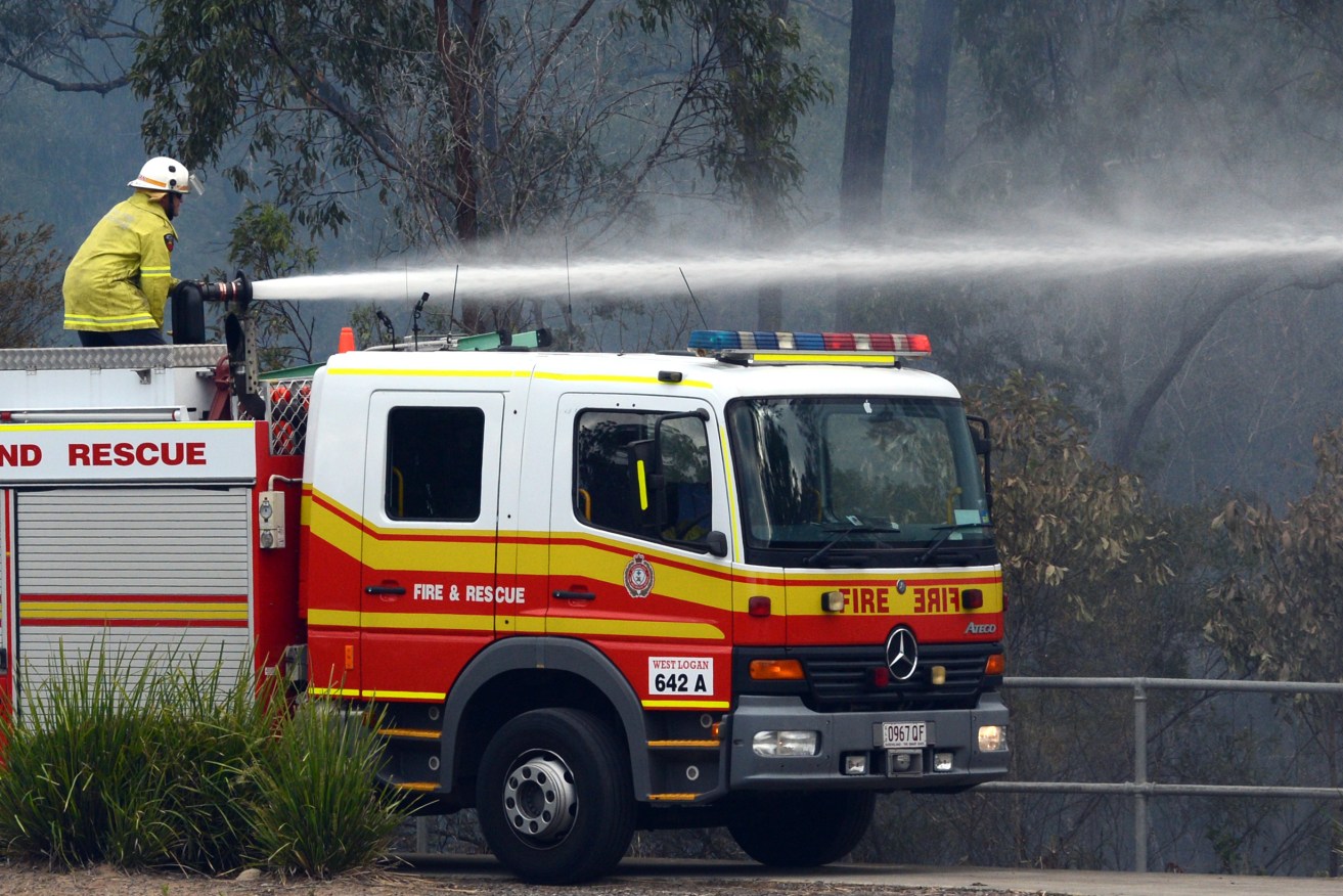Residents to the north of the Queensland town of Miles are on alert as firefighters try to bring a large bushfire under control.