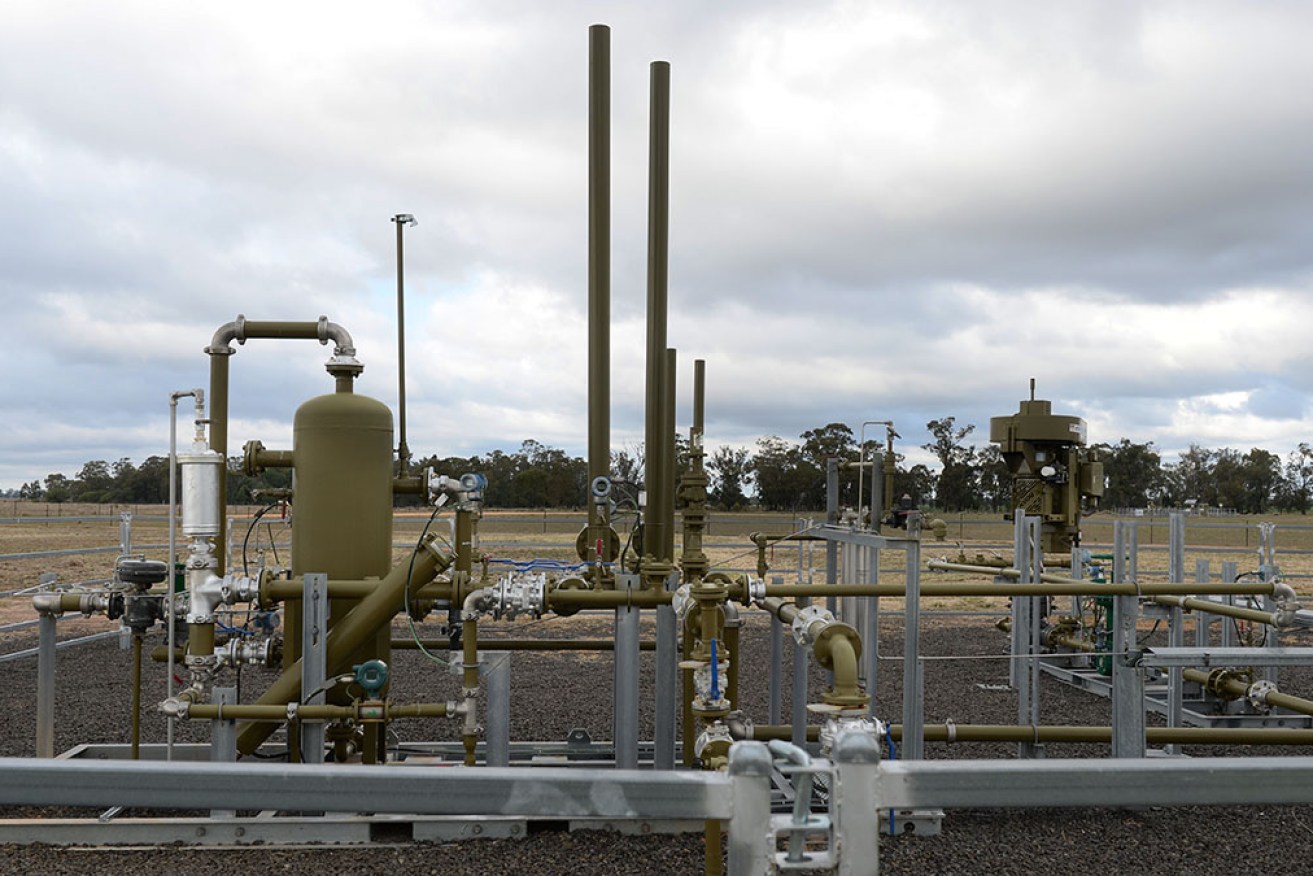 Santos has won federal approval to drill 116 new coal seam gas wells in Queensland.