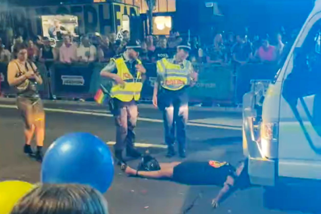 Police ask Lidia Thorpe to stop her one-woman protest as the parade ground to a halt. <i>Photo: NSW Police</i>