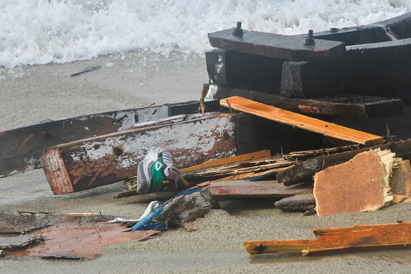 The boat broke apart in rough seas off the coast of southern Italy, with more than 30 dead.