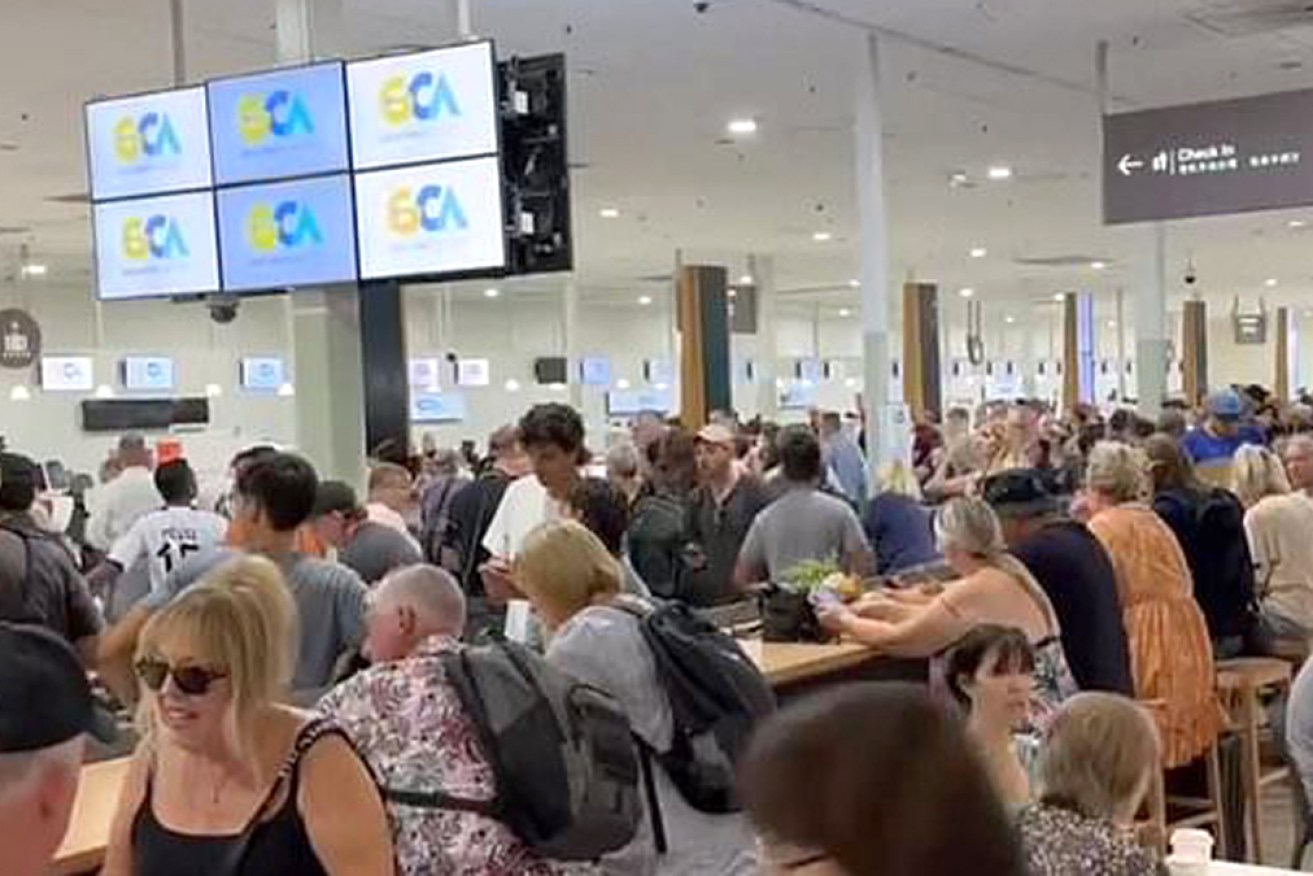 The packed terminal at Gold Coast airport on Monday morning.