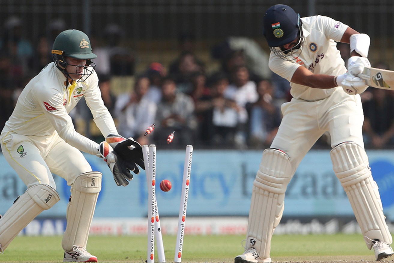 India's Cheteshwar Pujara is bowled by Australia's Nathan Lyon in the third Test in Indore on Wednesday.