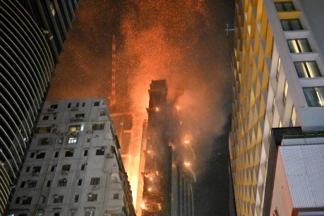 Firefighters battle Hong Kong shopping district fire