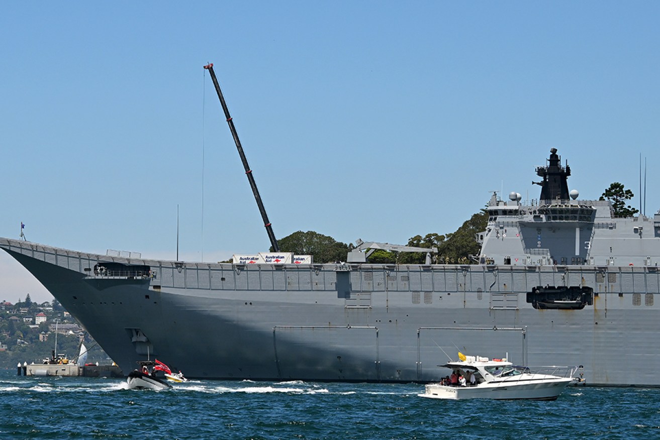 HMAS Canberra is expected to participate in drills in the contested South China Sea.