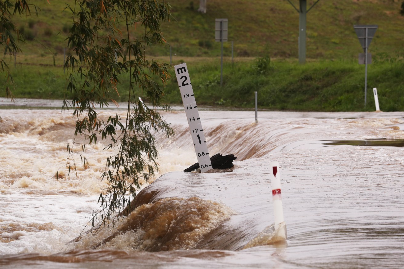 Heavy rain in the country's far north is causing rivers to swell, cutting off some roads.