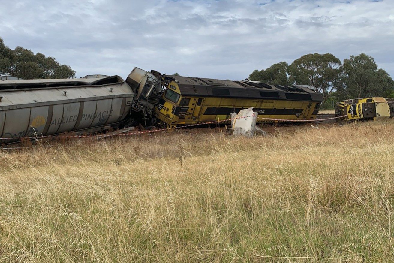 A freight train has derailed after colliding with a truck crossing tracks in southern NSW.