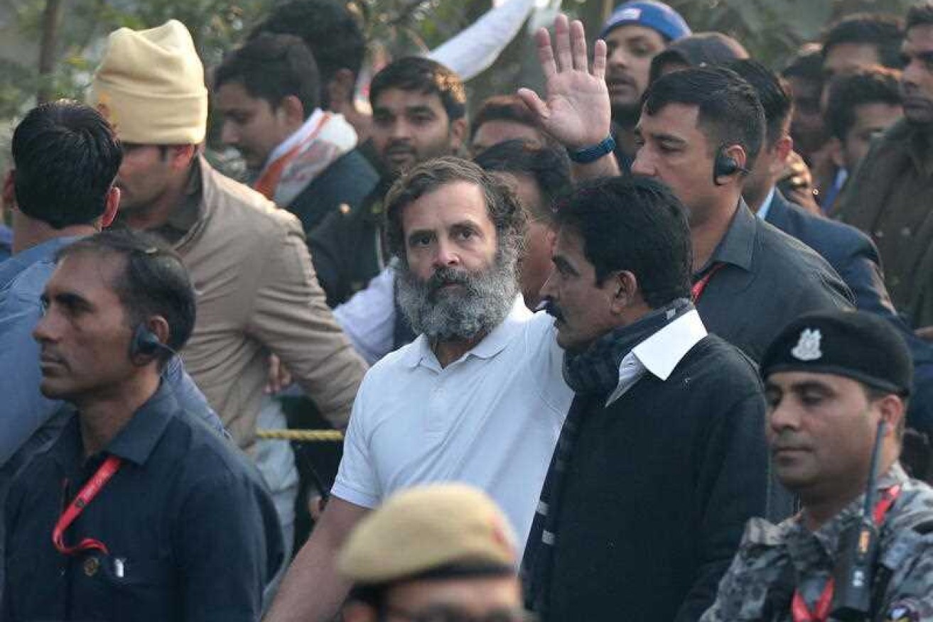 Indian opposition leader Rahul Gandhi [centre] has been found guilty of defamation.