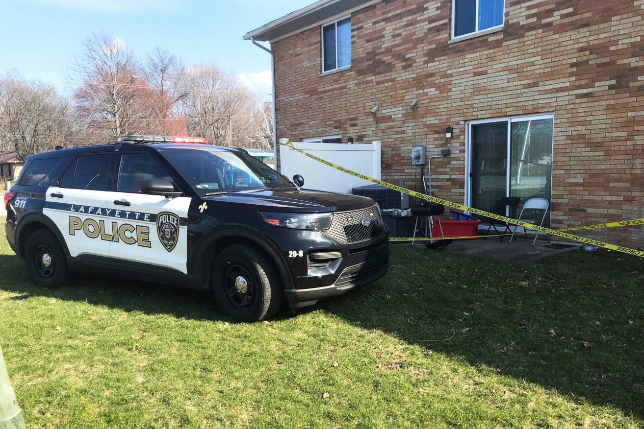 A 1-year-old child was shot and killed inside an apartment behind the police tape.