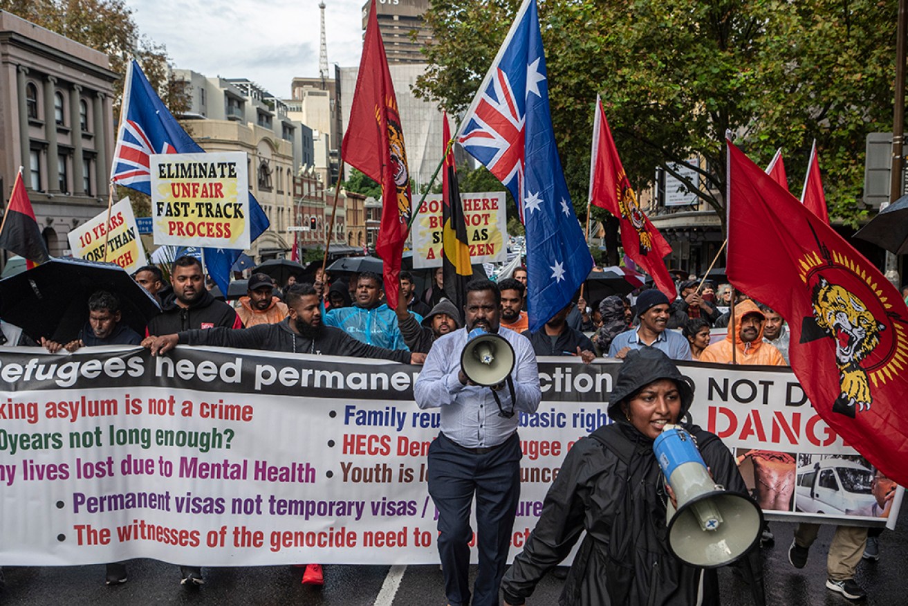 Palm Sunday rallies across Australia have called for better treatment of refugees and asylum seekers. <i>Photo: AAP</i>