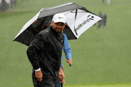 Aussies slip as extreme weather lashes Masters