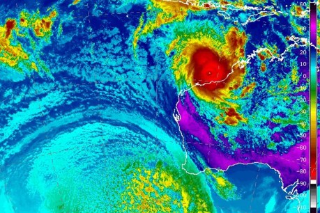 Cyclone Ilsa crosses coast, smashes wind speed record