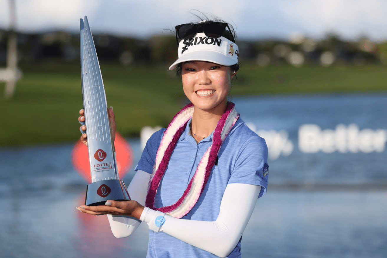 Grace Kim entered the Hawaii touranment a relative unknown. Now she's sporting a $300,000 smile. <i>Photo: AAP</i>