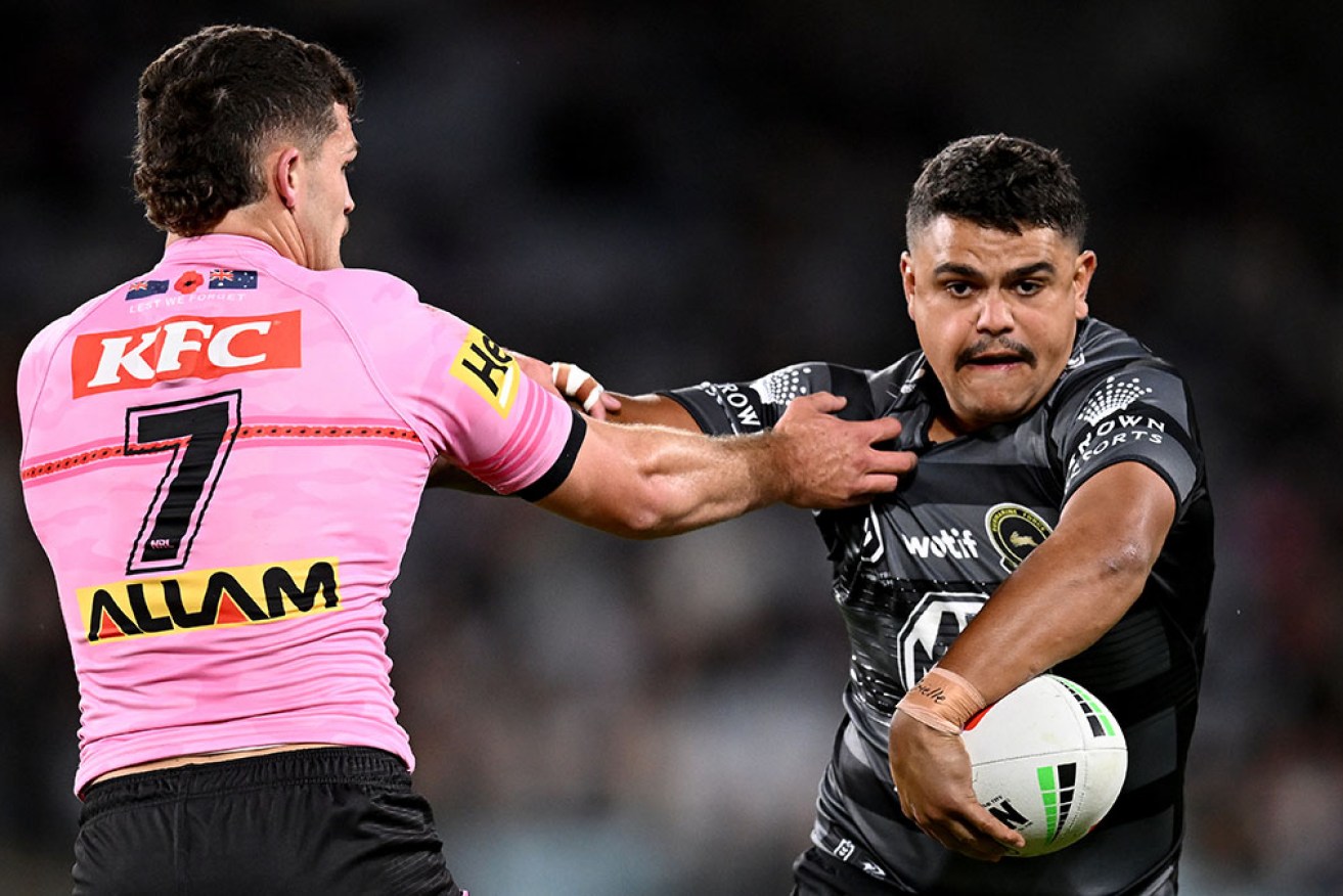 Souths fullback Latrell Mitchell has scored two tries in the Rabbitohs' 20-18 win over Penrith.