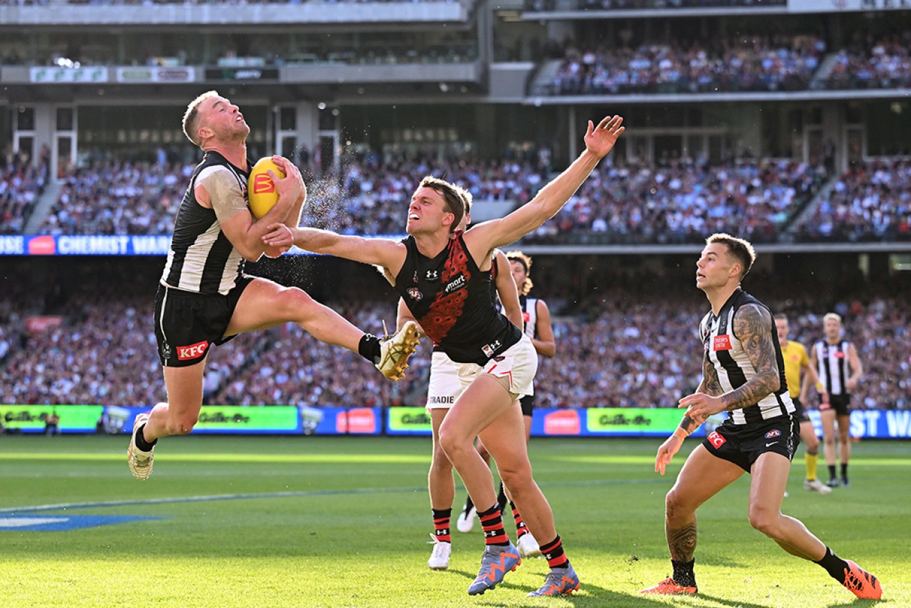 Collingwood has produced a thrilling late surge to beat Essendon by 13 points at the MCG. 
