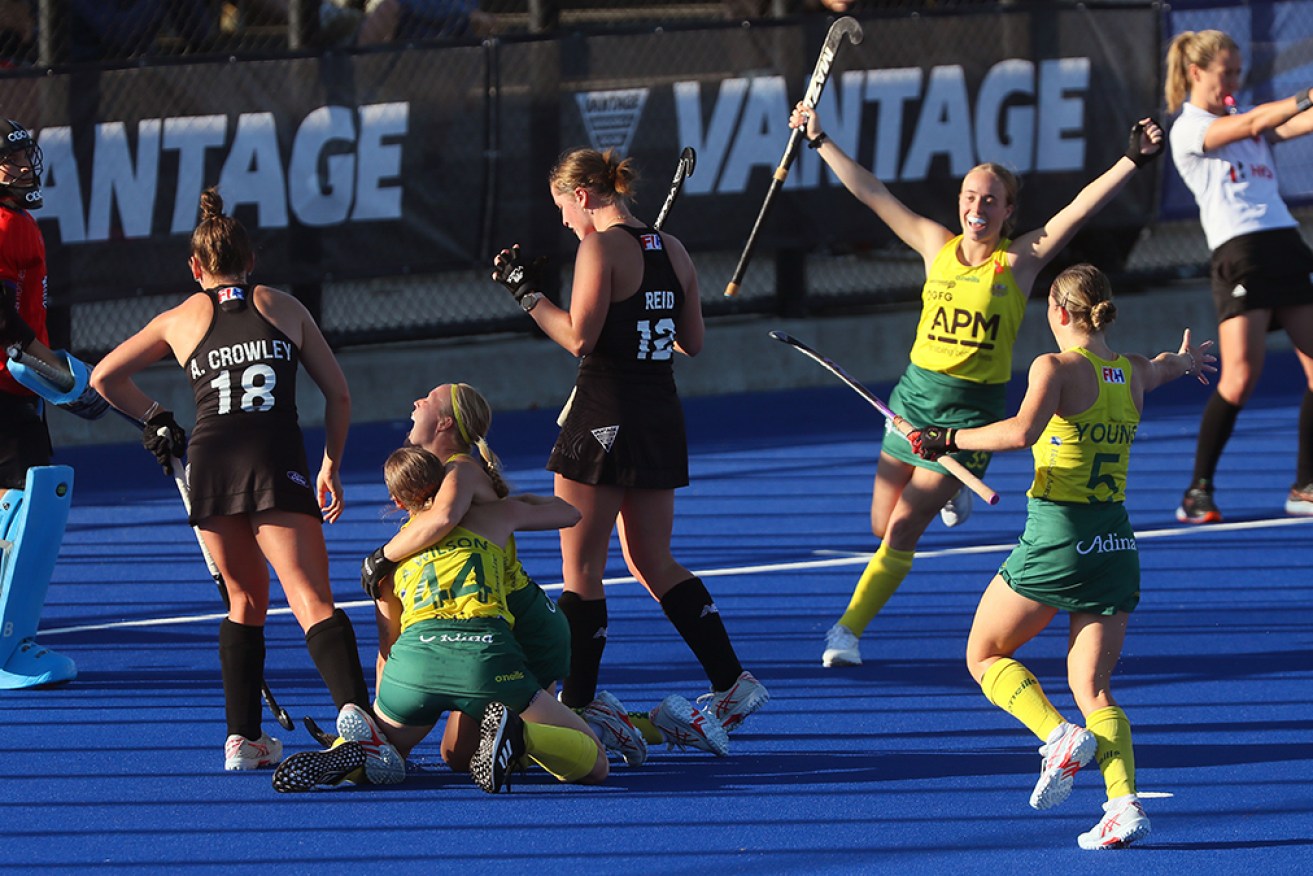 The Hockeyroos celebrate Abigail Wilson's goal in the 2-1 win over New Zealand in Christchurch.